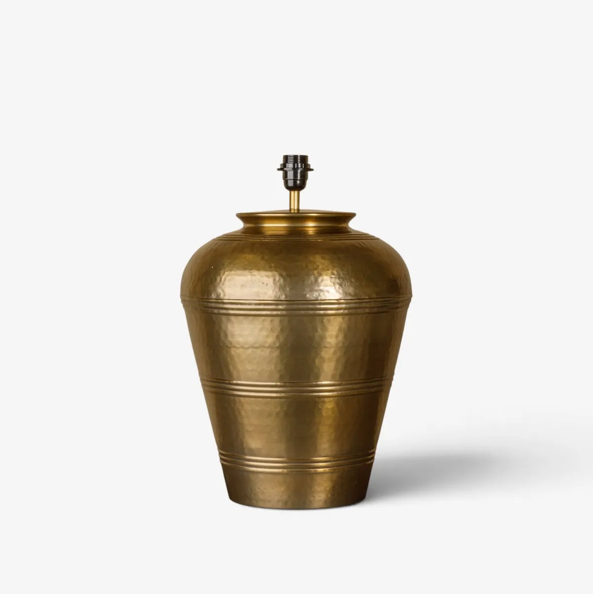 French Country Foundary Lampbase at Cerise.  Large metal lamp base finished in an antique gold colour. Measures 30 x 30 x 43cm H.  Shade is sold seperately and freight charge to be quoted for shipping.