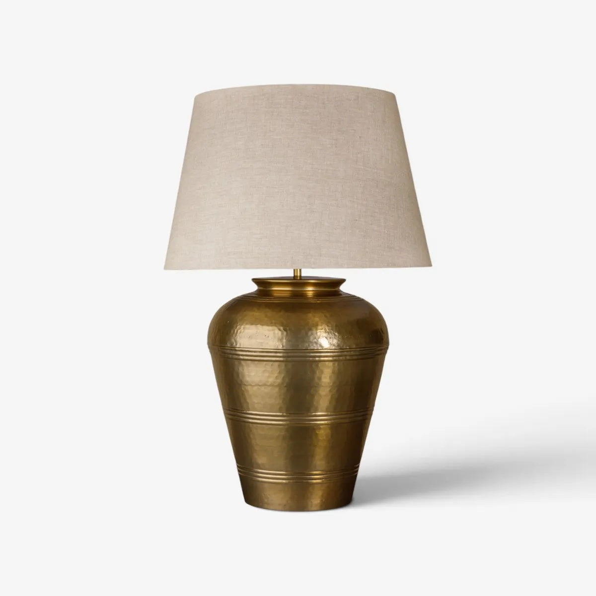 French Country Foundary lampbase in antique gold at Cerise.  Shown here with a shade which is to be sold seperately.