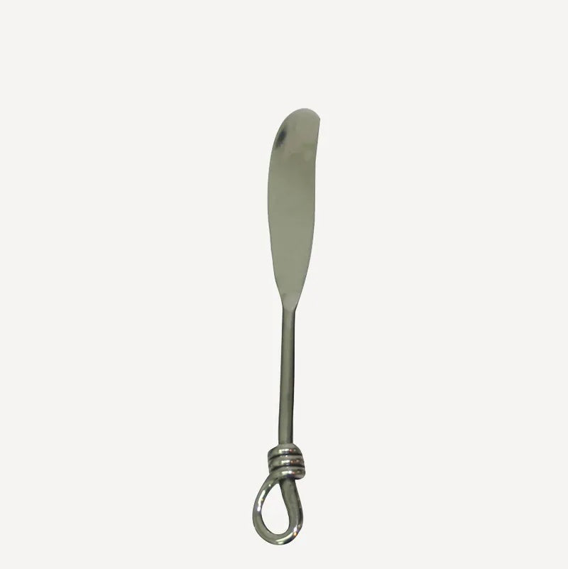 French Country stainless steel butter knife at Cerise.  feature a knot at the base of the handle.