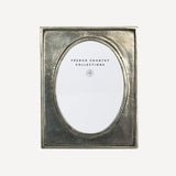 French Country Oval Pewter Photo Frame at Cerise.  Takes a 3 x 4 inch photo.  Genuine hallmark stamped pewter.  Heirloom quality.