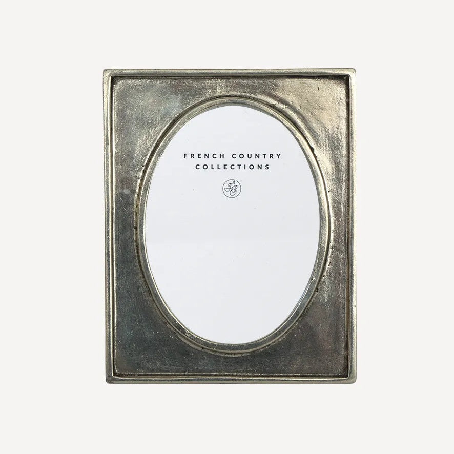 French Country Oval Pewter Photo Frame at Cerise.  Takes a 3 x 4 inch photo.  Genuine hallmark stamped pewter.  Heirloom quality.