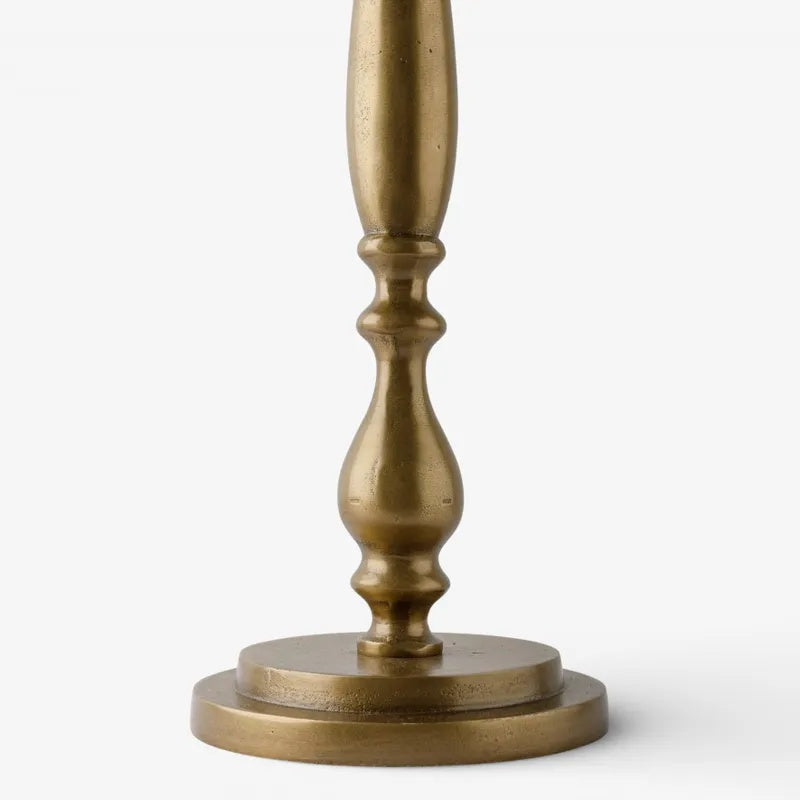 Elevate your living space with the Sutton Side Table from French Country at Cerise. Featuring a timeless antique gold metal base paired with a beautifully veined natural marble top in warm, earthy tones. Blending classic elegance with contemporary style, this versatile piece is perfect beside a sofa, armchair, or bed.
