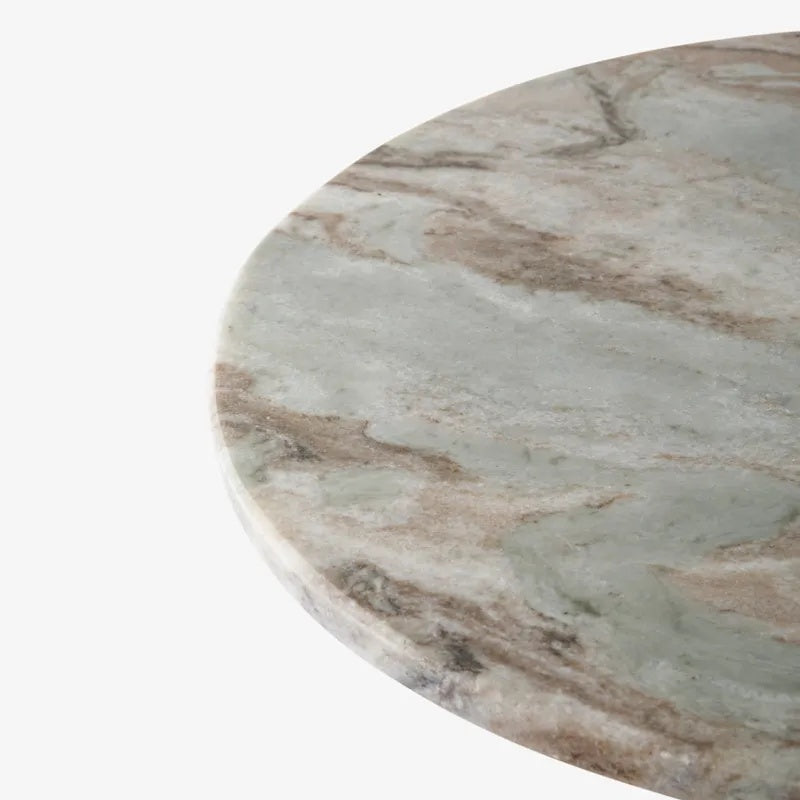  The Sutton Side Table from French Country at Cerise,  featuring a timeless antique gold metal base paired with a beautifully veined natural marble top in warm, earthy tones. Blending classic elegance with contemporary style, this versatile piece is perfect beside a sofa, armchair, or bed.