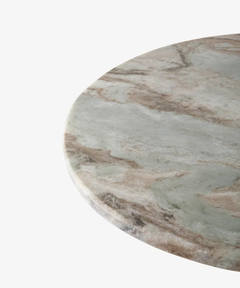  The Sutton Side Table from French Country at Cerise,  featuring a timeless antique gold metal base paired with a beautifully veined natural marble top in warm, earthy tones. Blending classic elegance with contemporary style, this versatile piece is perfect beside a sofa, armchair, or bed.
