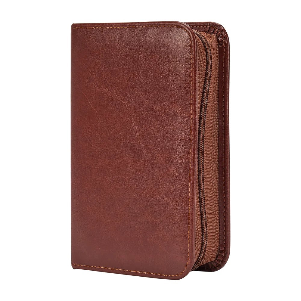Gentlemans grooming  kit in brown vegan leather includes It includes a shaver, extra blades, hair trimmer*, 2 sizes of nail clippers, tweezers, scissors, nail file, cuticle pusher, comb, and toothbrush, in a zip up organiser.