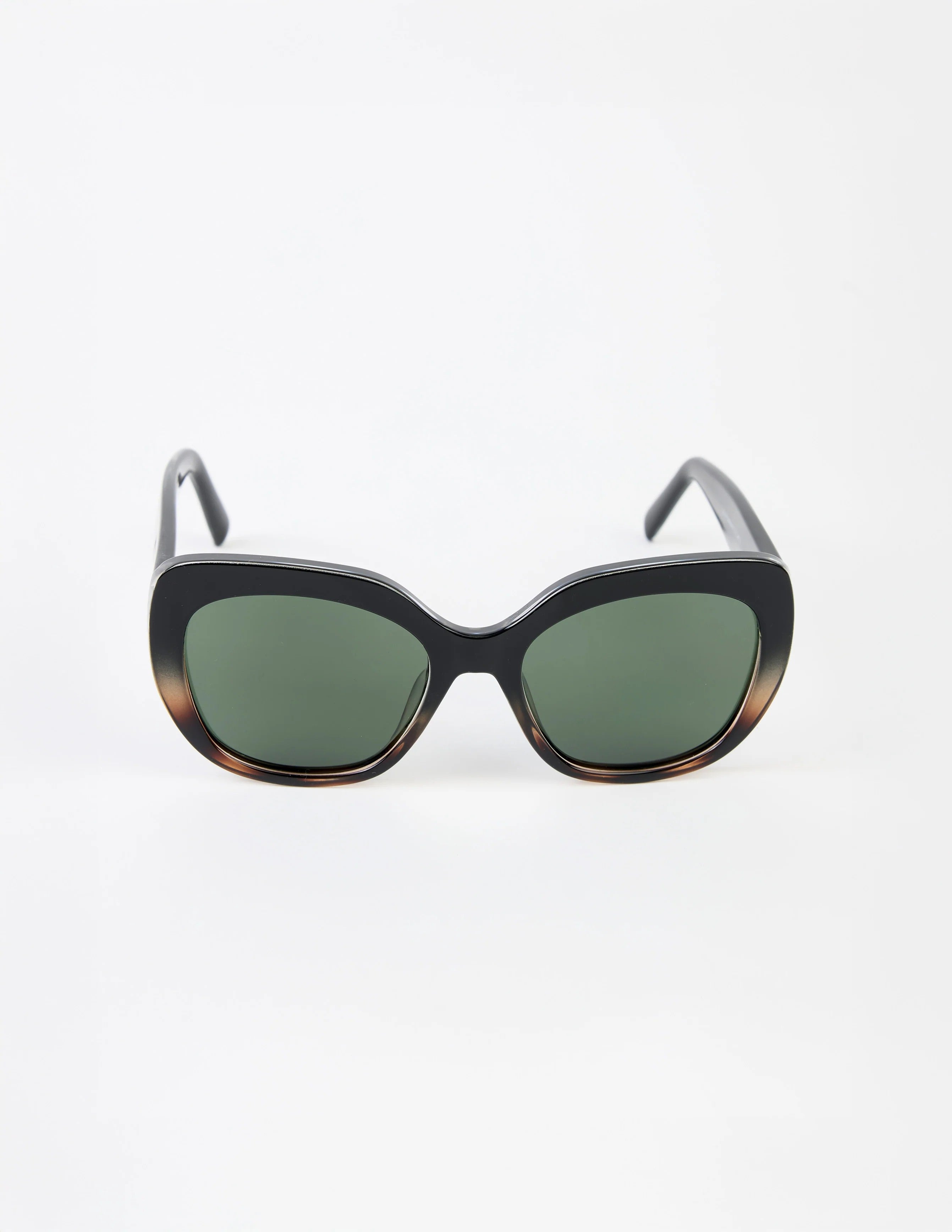 Sunglasses with a transparent Tort frame
