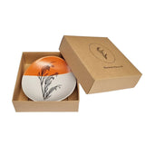 10cm porcelain bowl orange and shite with black harakeke flower