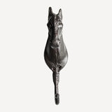 Metal horse head hook on a white background