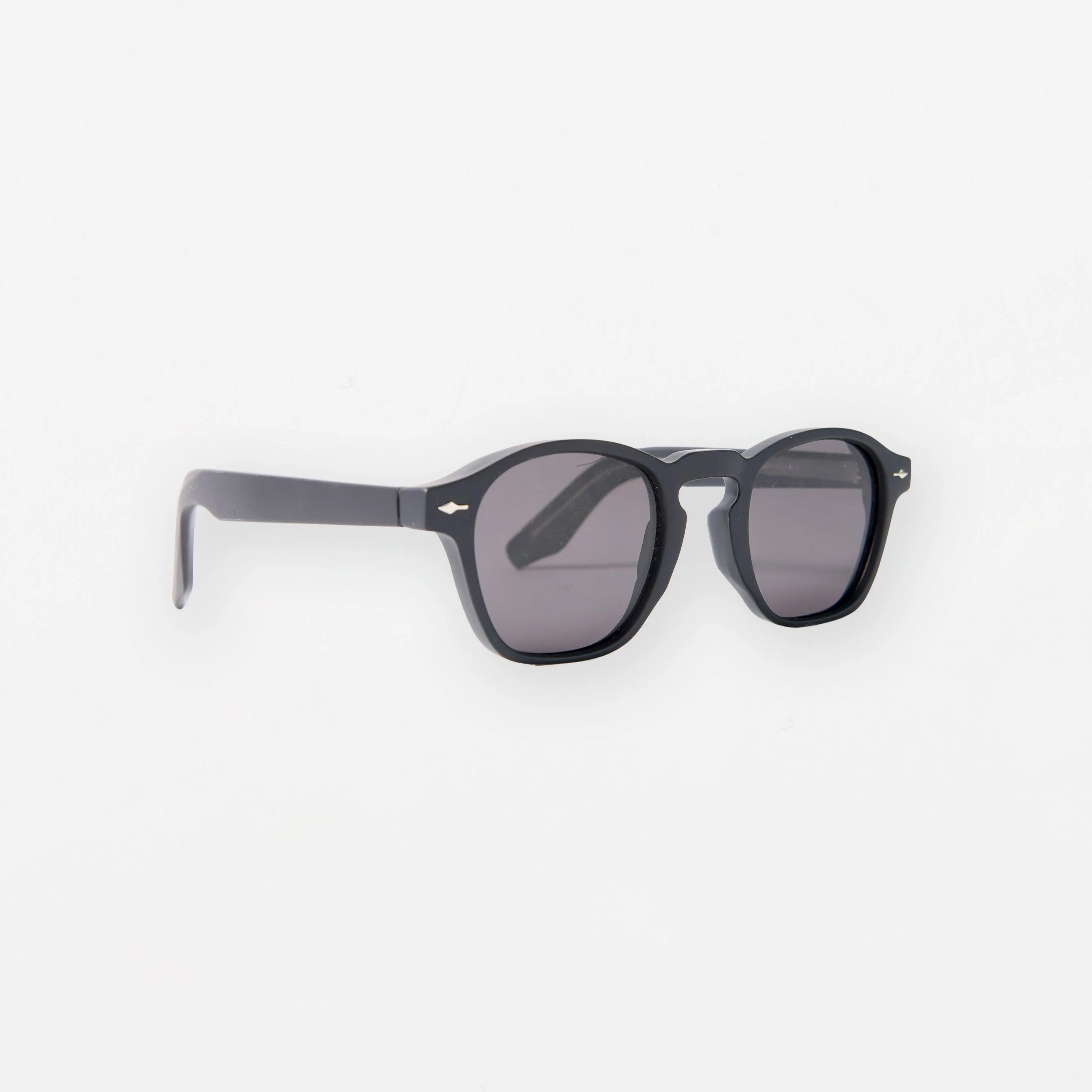 Black sunglasses on a white background