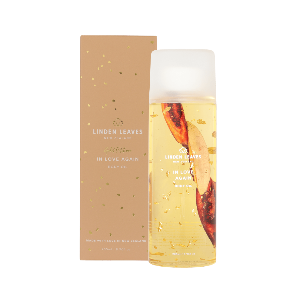 In Love Again Gold Edition Body oil by Linden Leaves  in a  265ml bottle, infused with 23K gold flakes and comes Gift Boxed at Cerise.