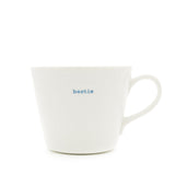 White mug with 'bestie' text in blue on a white background