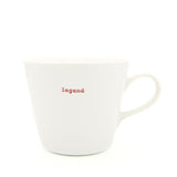 White mug with 'legend' text in red on a white background
