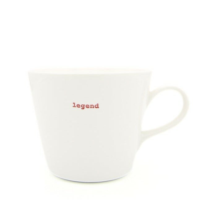 White mug with 'legend' text in red on a white background