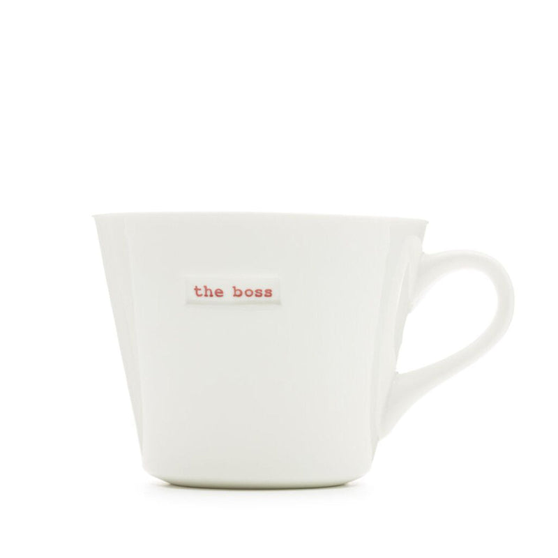 White mug with 'the boss' text on a white background