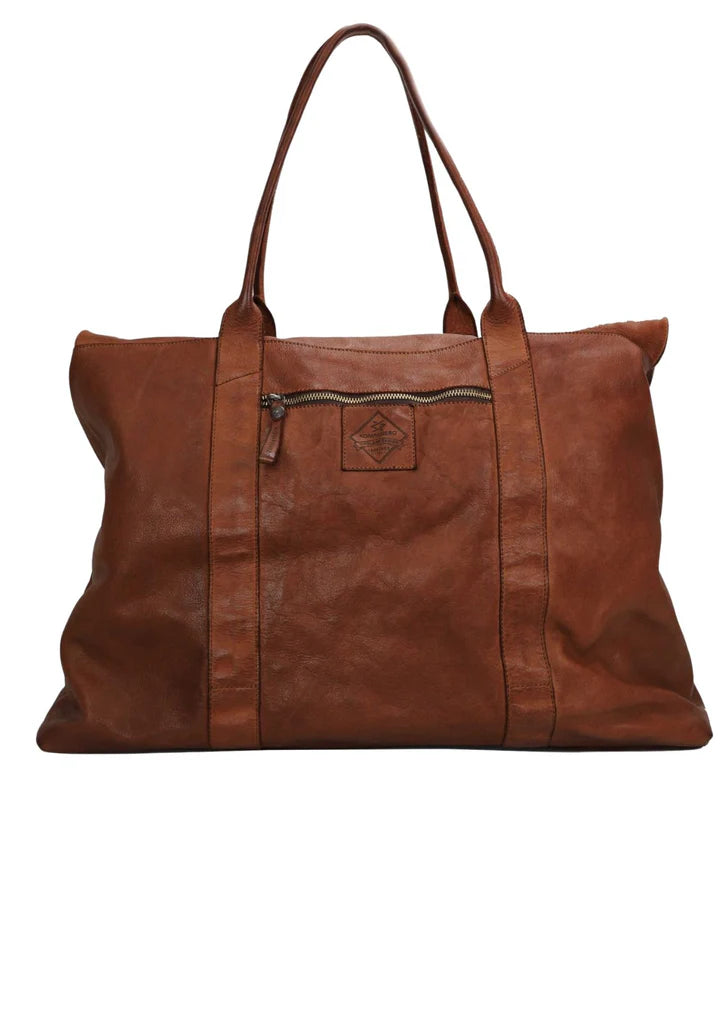 Kerina leather overnight bag with cotton lining in cognac colour