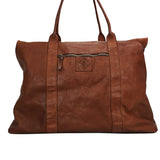 Kerina leather overnight bag with cotton lining in cognac colour
