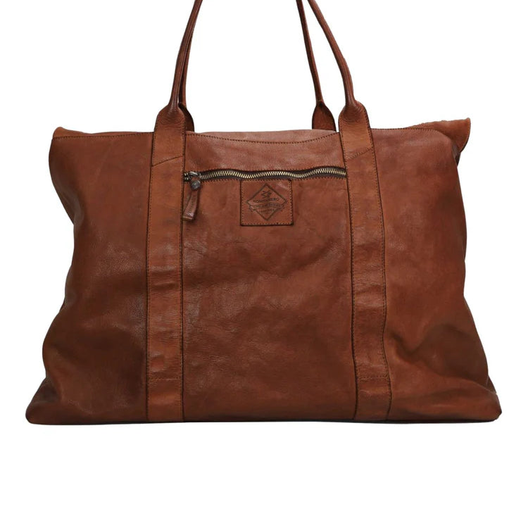 Kerina leather overnight bag with cotton lining in cognac colour