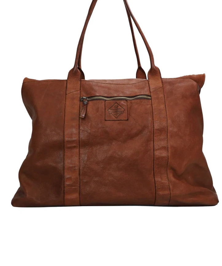 Kerina leather overnight bag with cotton lining in cognac colour