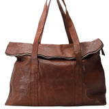 Kerina leather overnight bag with cotton lining in cognac colour