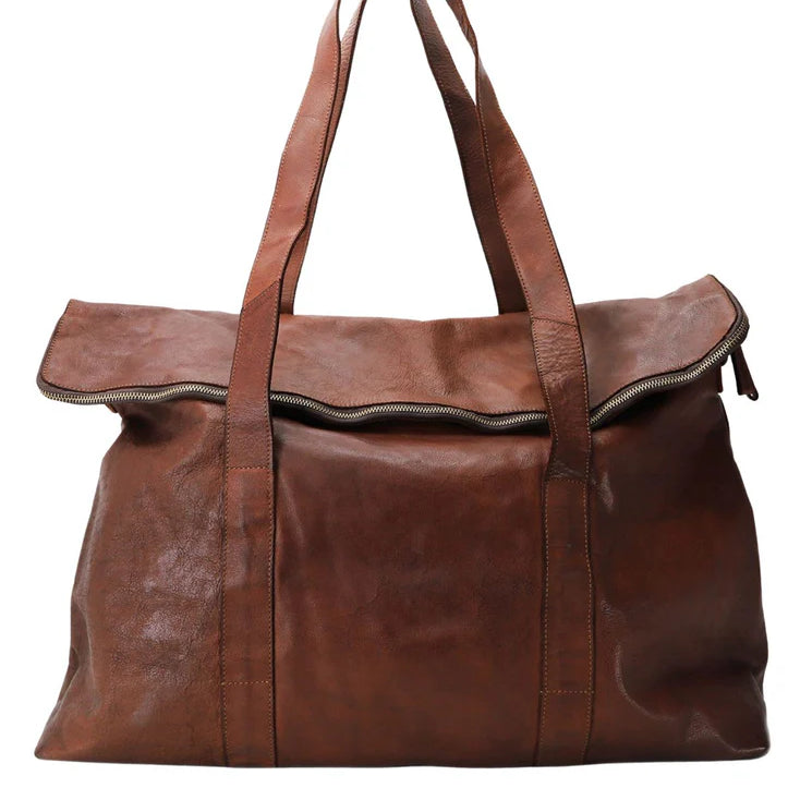 Kerina leather overnight bag with cotton lining in cognac colour