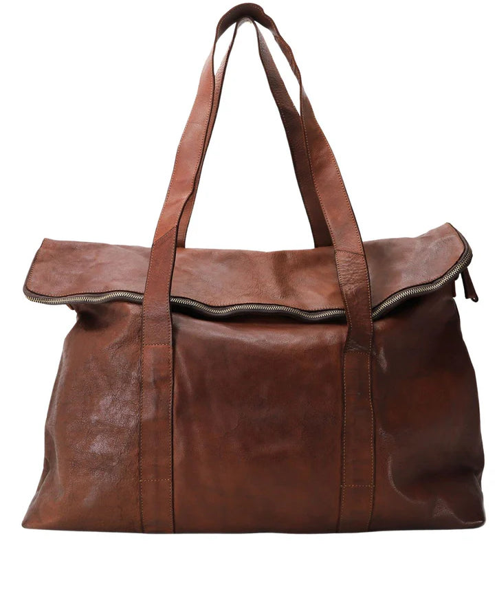 Kerina leather overnight bag with cotton lining in cognac colour