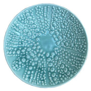 Aqua kina ceramic bowl with bubble pattern on a white background