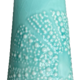 Aqua ceramic kina jug with white bubble texture on a white background