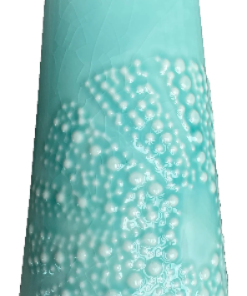 Aqua ceramic kina jug with white bubble texture on a white background