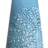 Blue ceramic kina jug with white bubble texture on a white background