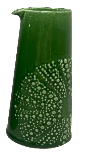 Green ceramic kina jug with white bubble texture on a white background