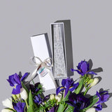 Image of Grey Black Iris LIving Light mini icicle candle in a white gift box.