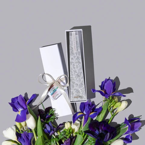 Image of Grey Black Iris LIving Light mini icicle candle in a white gift box.