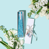 Image of an Ocean Sage Blue LIving Light mini icicle candle in a white gift box.