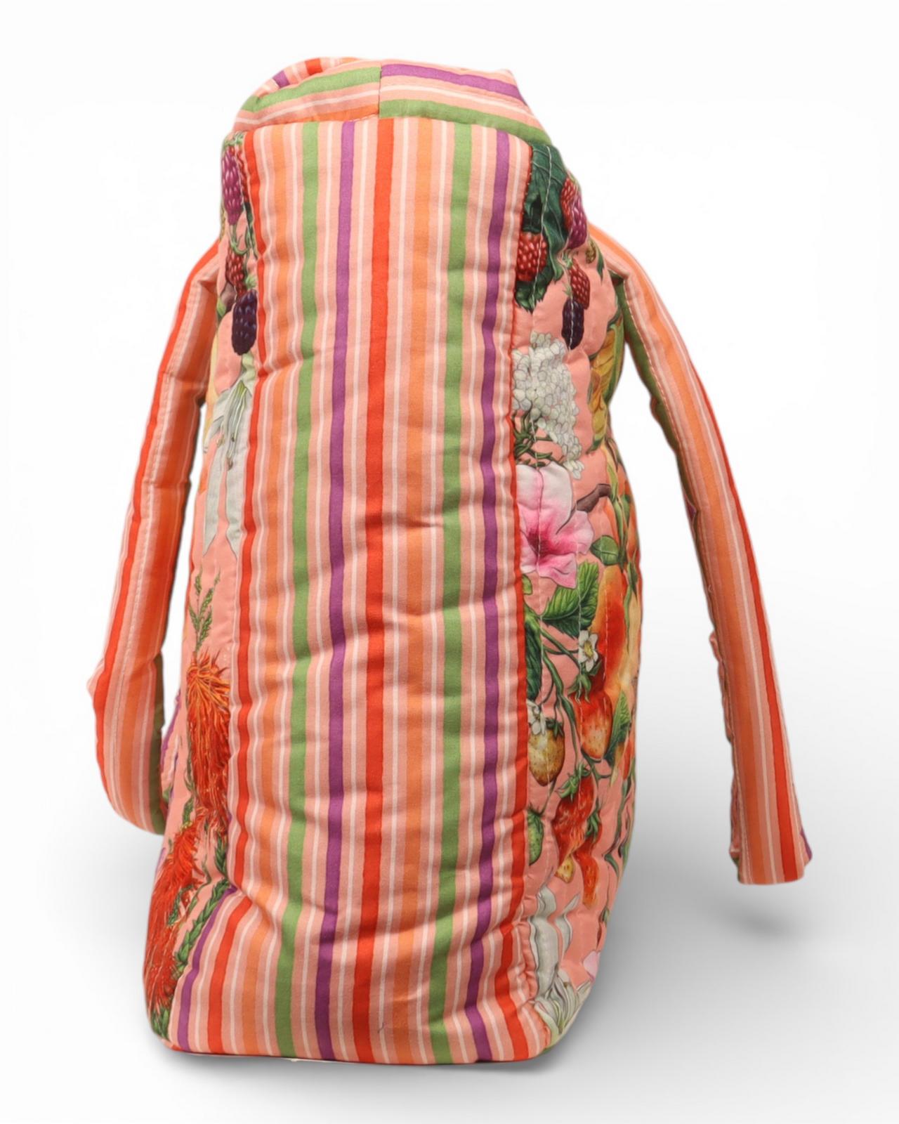 Colourful Bountiful Harvest tote bag with padded straps and botanical print and contrast side panels at Cerise