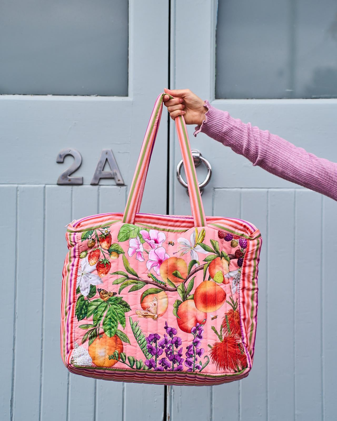 La La Land Comforter Bag in vibrant fruit and floral Bountiful Harvest print at Cerise