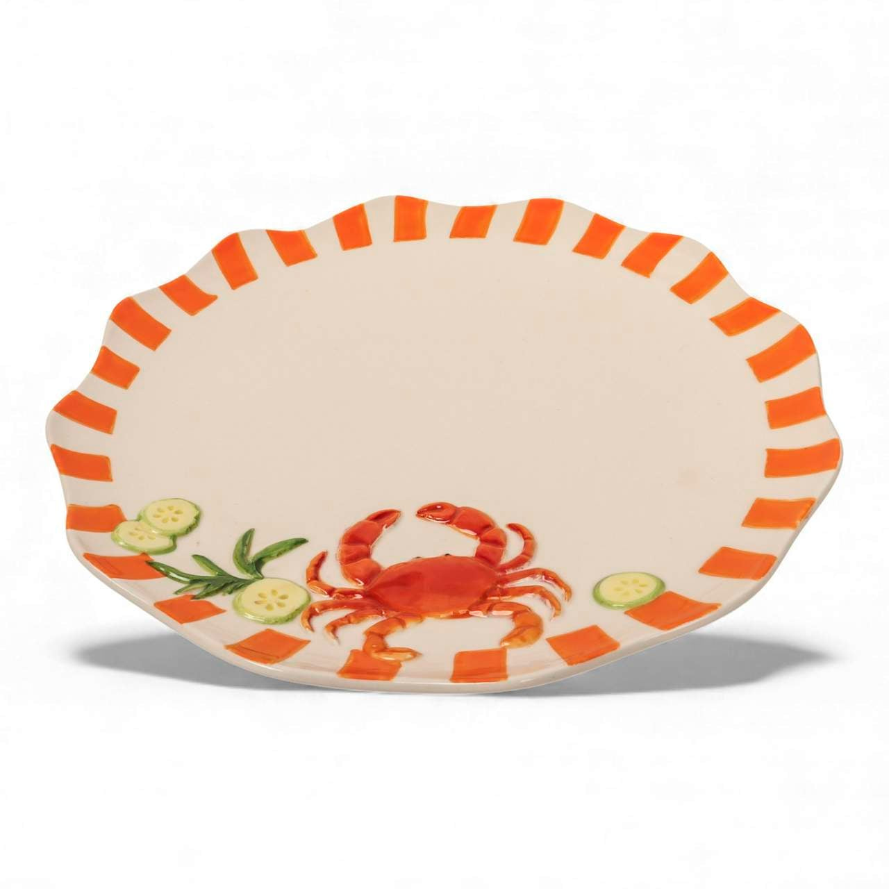 La La Land crab dinner plate with scalloped edge and bold striped border at Cerise