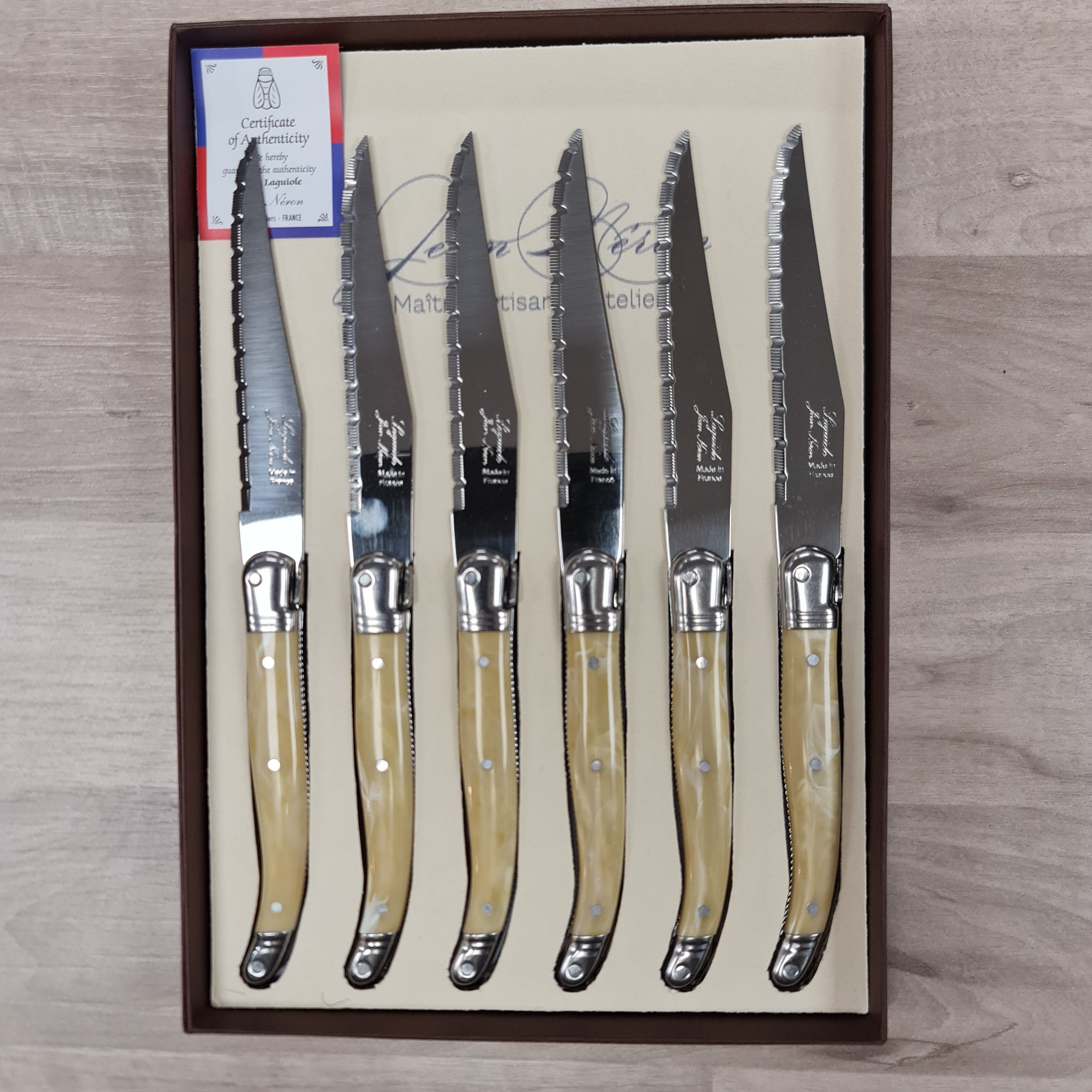 Set of 6 horn coloured steak knives with bee icon at Cerise NZ
