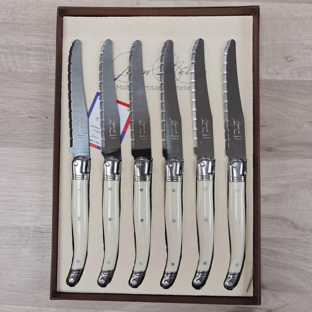 Set of 6 Laguiole by Jean Neron table knives with Ivory handles and the iconic bee motif in a gift box at Cerise NZ