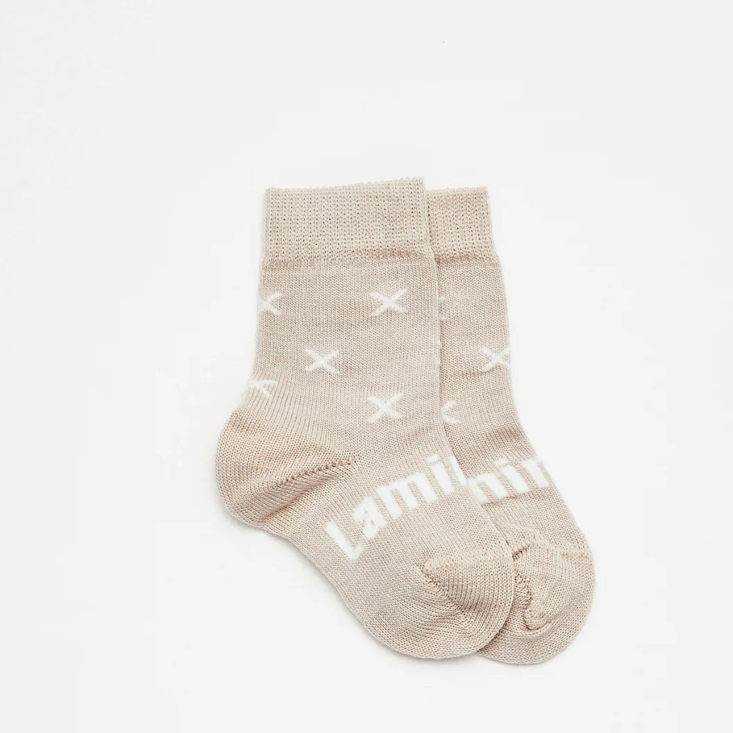 Lamington Merino Wool Baby Socks at Cerise in Ted design featuring white crosses on oatmeal base.