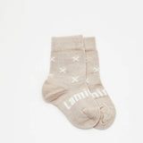 Lamington Merino Wool Baby Socks at Cerise in Ted design featuring white crosses on oatmeal base.