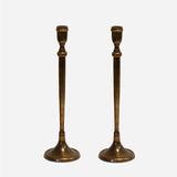 London Candlestick made of aluminium with antique brass coloured finish, measuring 370mm High.