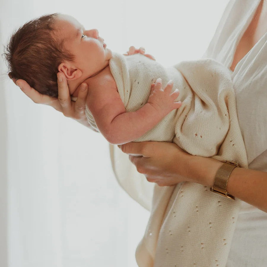 A beautiful and timeless newborn baby gift, from Cerise.  This premium knitted baby blanket is made from 100% merino wool and designed to be treasured for years to come. Wonderfully soft and fine, merino wool is exceptionally gentle on delicate baby skin, providing natural comfort from the very beginning.