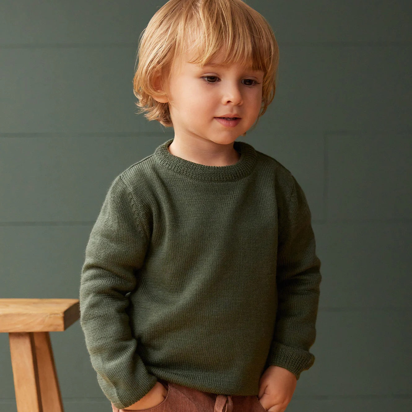 Merino Knit Pullover Jumper in thyme colour a lovely dark green.  It has a crew neckline.