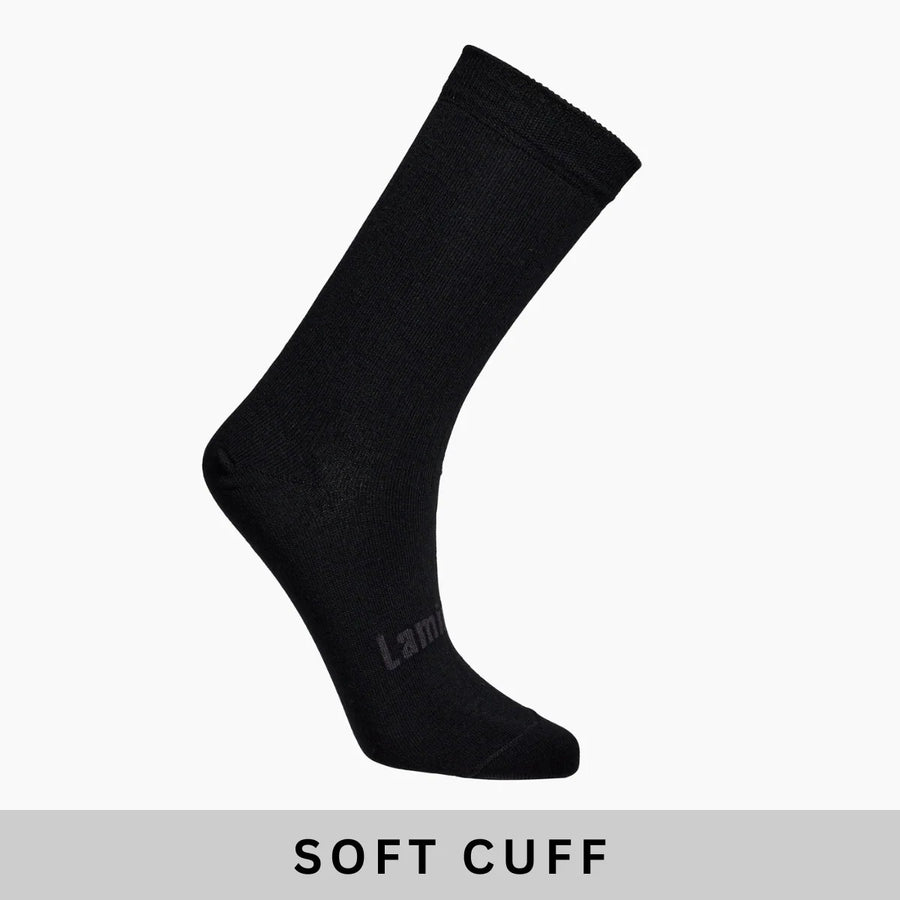 Black sock with 'Lamington' branding on a white background