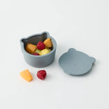Over the dandelions Mini Bear Snack Box in Blue at Cerise.  Made from food grade silicone, BPA free, soft for little hands and easy to wash,  Great for snacks on the go such as fruit or crackers.