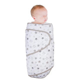 Miracle Blanket Baby Swaddle in Stars pattern at Cerise