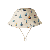 Bucket hat with sailboat pattern on a white background