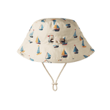 Beige sun hat with sailboat pattern on a white background showing adjustable toggle drawstring