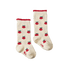 Pair of cream socks with red raspberry pattern on a white background