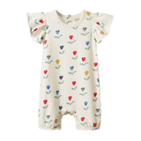 Tilly bodysuit with short legs and flutter sleeves in a floral print on a natural background - Front view